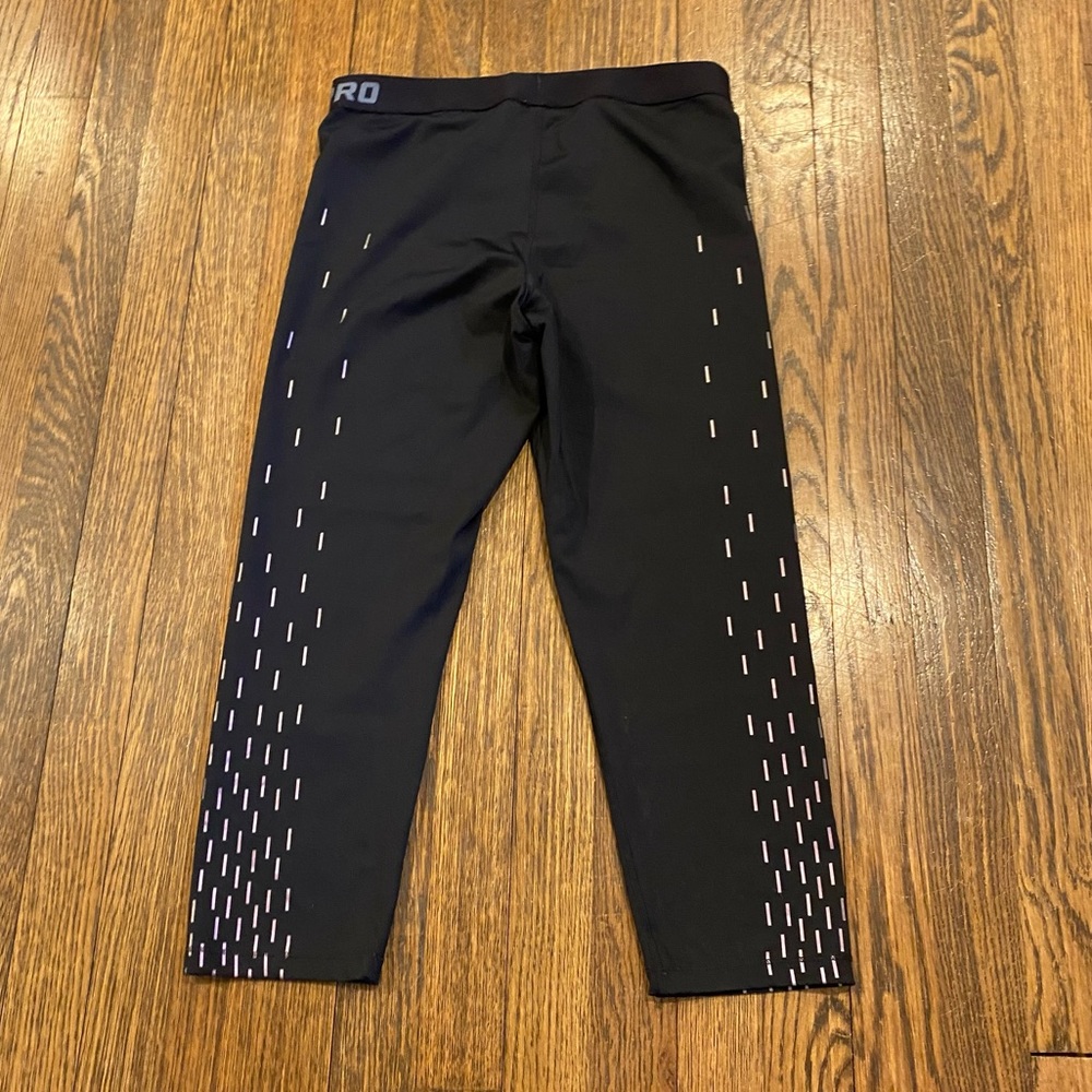 Nike Pro capri leggings. Black with light pink design. Ladies size L